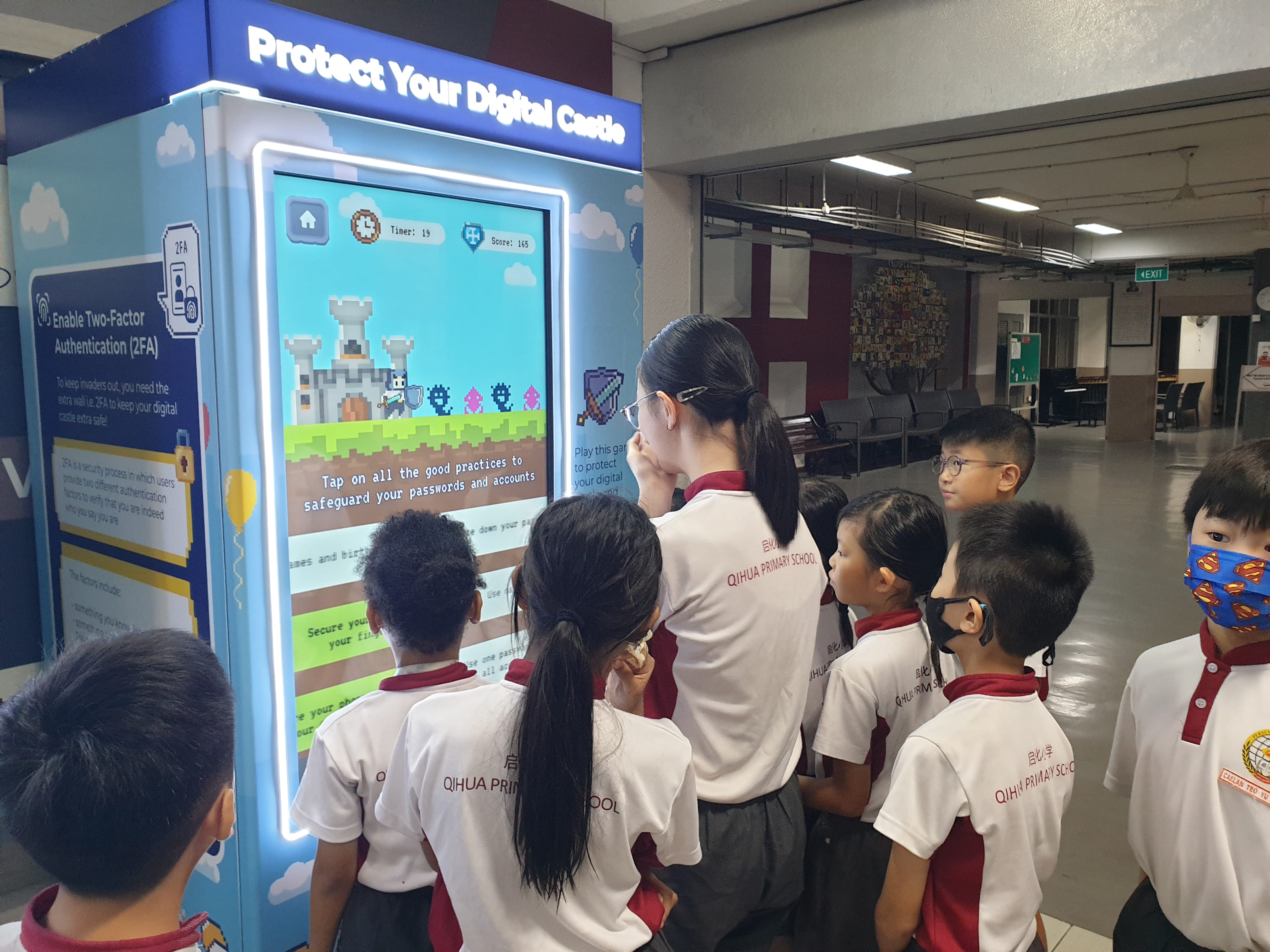 students play games on cyber digital game machine with the machine title protect your digital castle. 